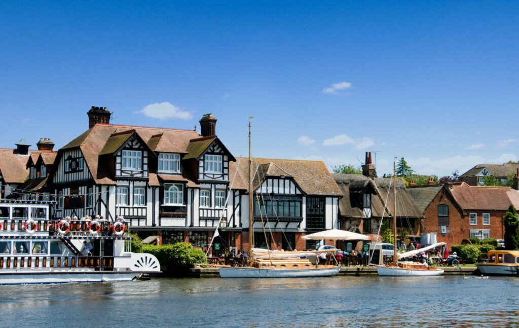 Horning, Norfolk Broads village showing the Swan Inn and the Southern Comfort paddle boat