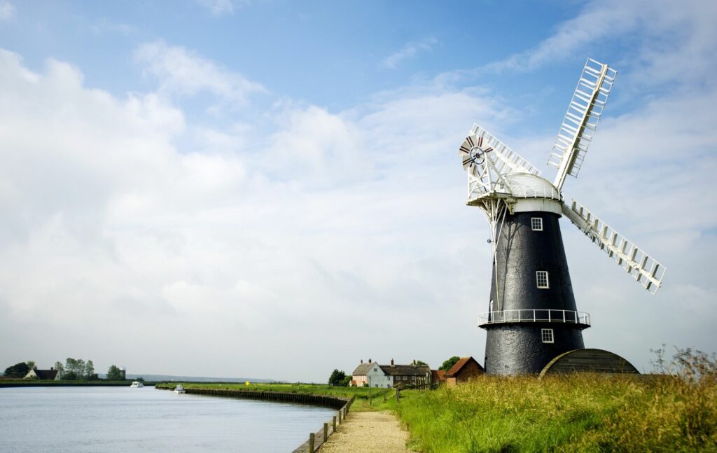 Norfolk Broads Property, black and white windmill on the Norfolk Broads