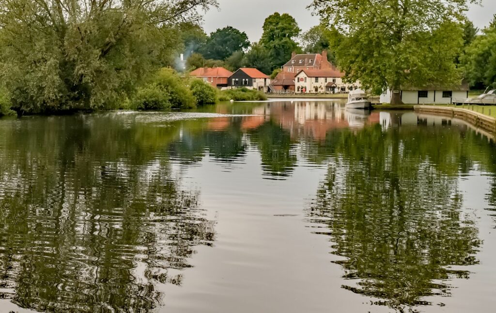 Coltishall, River Bure in Norfolk with Rising Sun pub in background